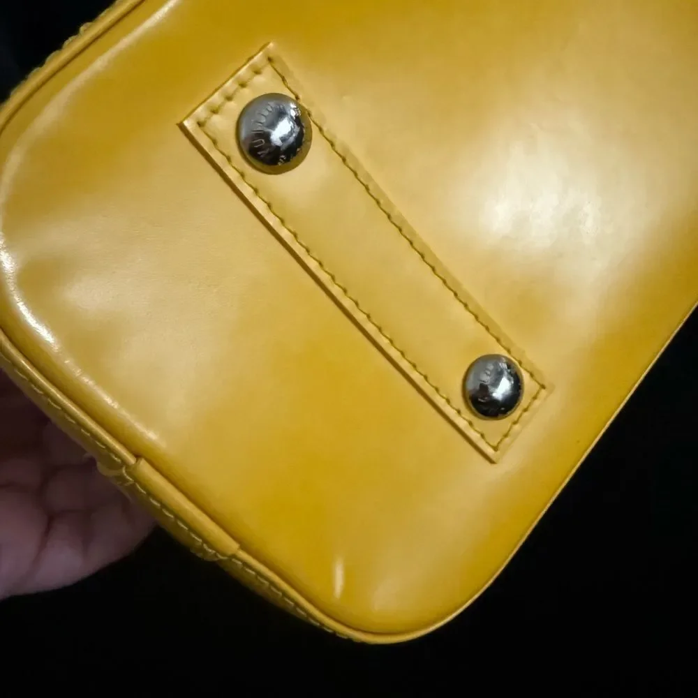Used excellent condition Louis Vuitton Epi Alma BB with strap